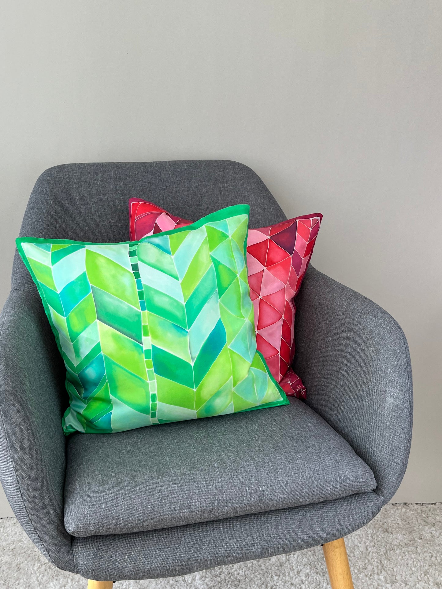 Geometric Brights in Green - hand made and hand painted silk cushion with zip